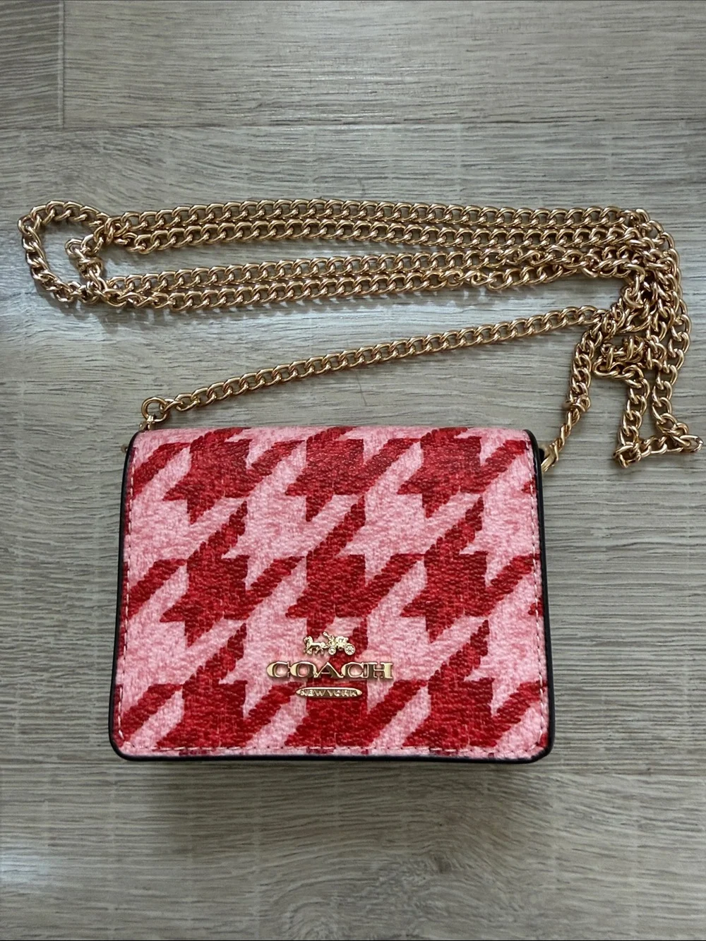 Coach Red and Pink Houndstooth Mini wallet with crossbody chain